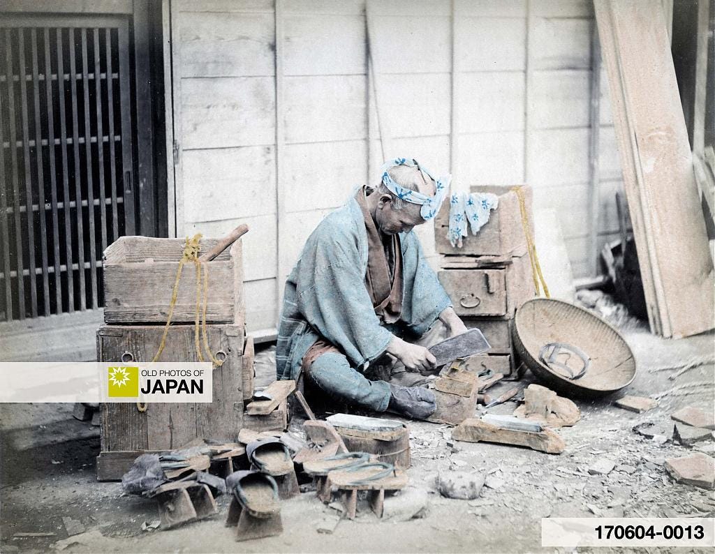 170604-0013 - Geta repairman at work on the street, 1880s