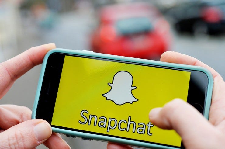 Snapchat logo phone 2016 billboard 1548