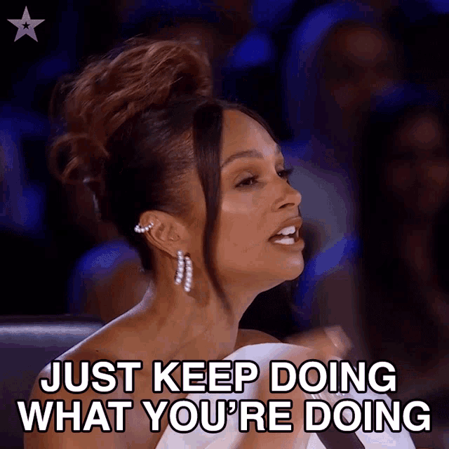 gif of Alesha Dixon encouraging someone on a talent show