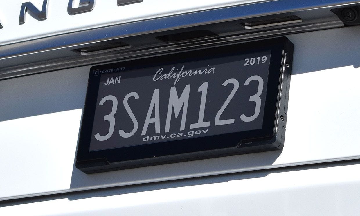 Photographer of Reviver Auto's customizable license plate.
