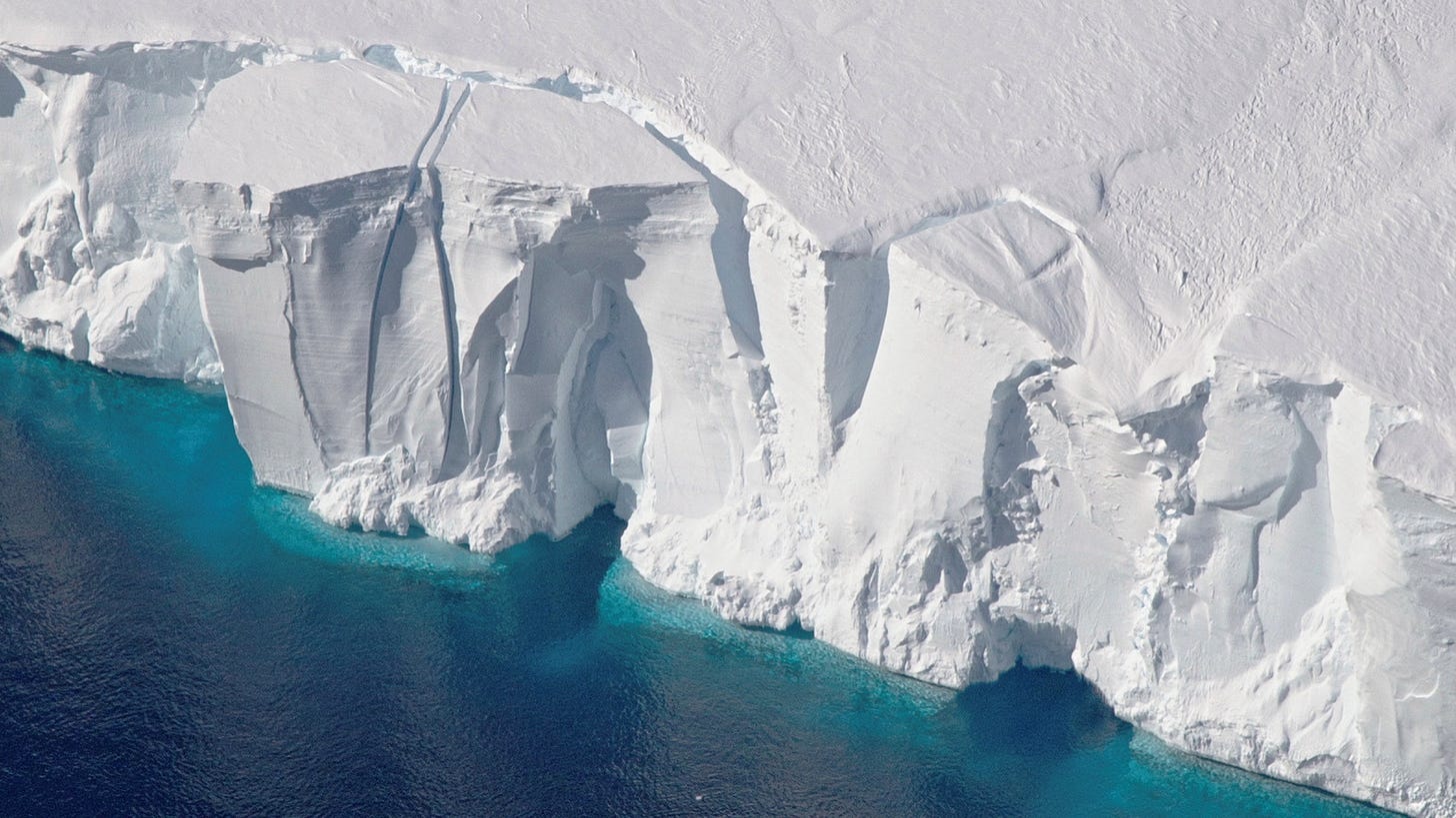 An aerial view of the 200-foot-tall (60-meter-tall) front of the Getz Ice Shelf with cracks