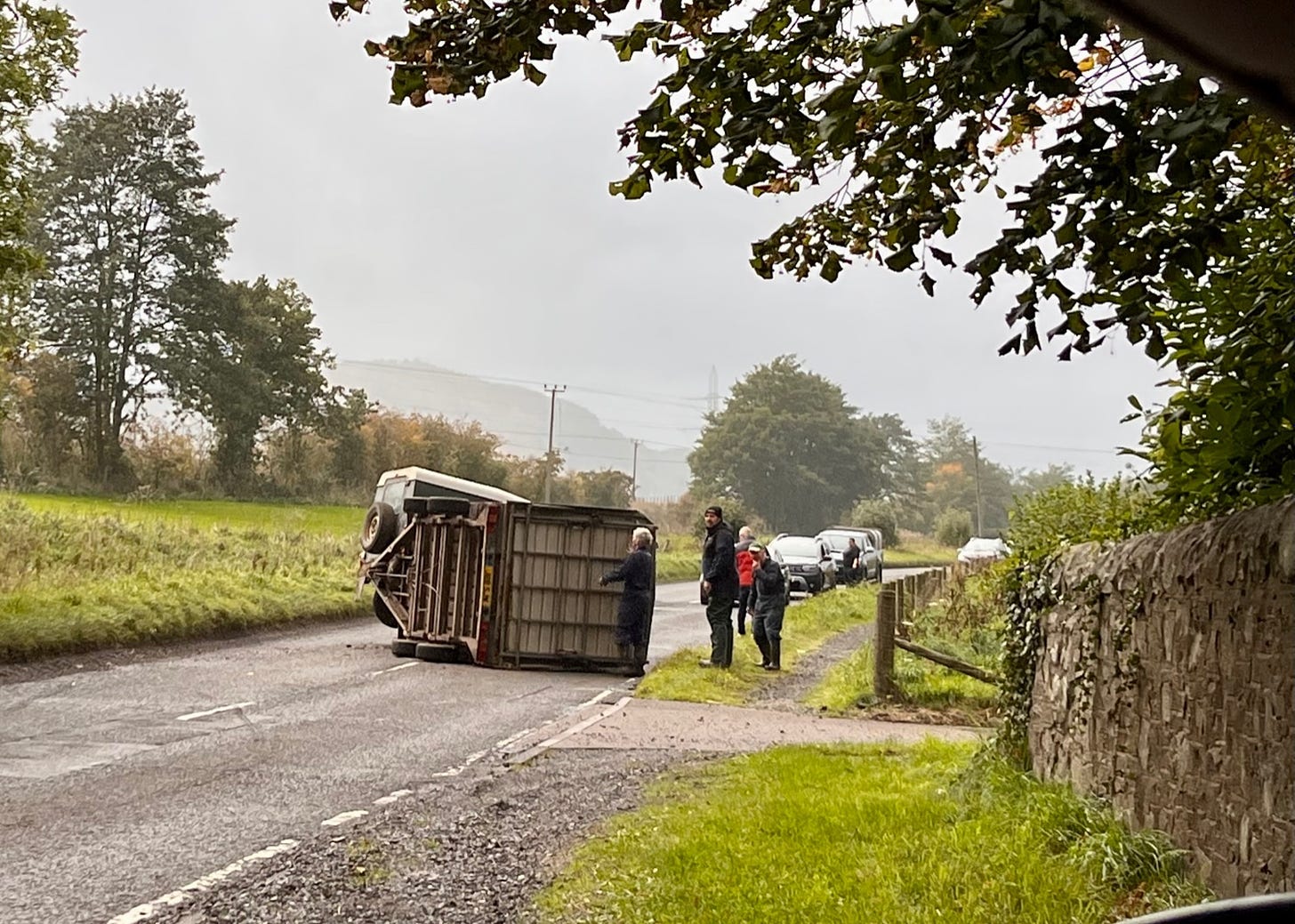overturned horse trailer on Scottish country road