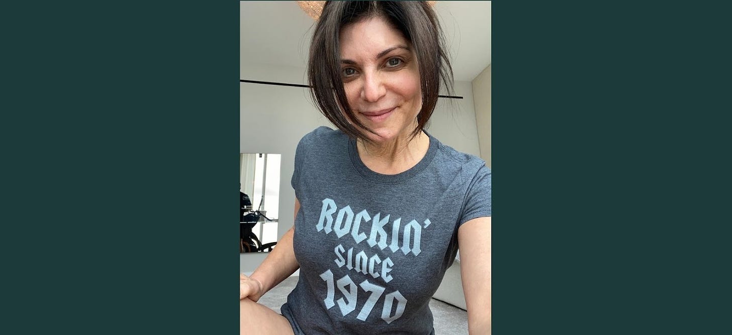 Tamsen wearing a shirt that says Rockin' since 1970.