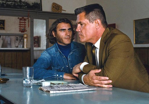 Joaquin Phoenix stars as Doc Sportello and Josh Brolin stars as Detective Christian F. "Bigfoot" Bjornsen in "Inherent Vice," a 2014 Warner Brothers release adapted from Thomas Pynchon's novel and directed by Paul Thomas Anderson.