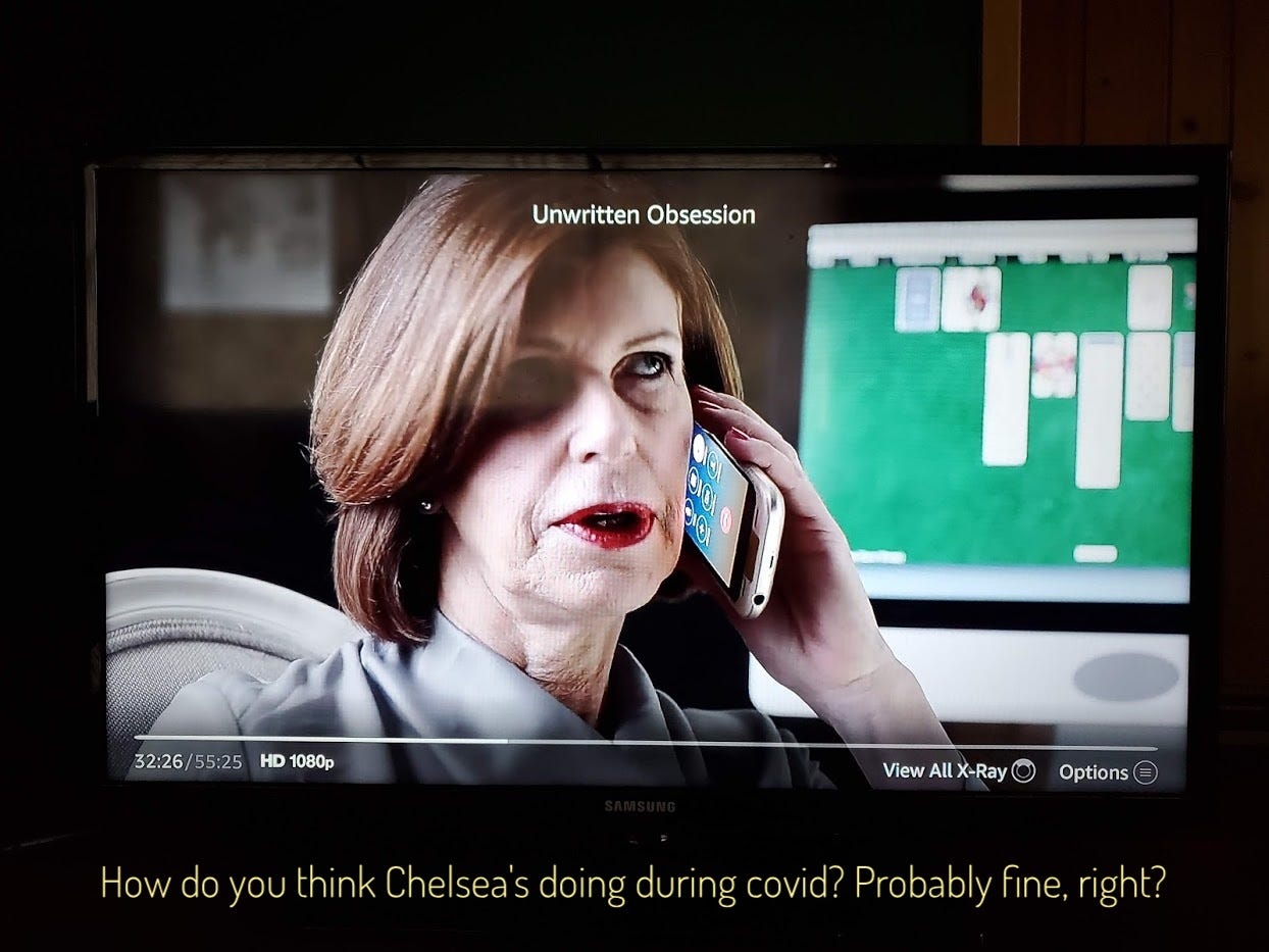 A very polished older white woman talking on the phone while playing computer solitaire, captioned "How do you think Chelsea's doing during covid? Probably fine, right?"