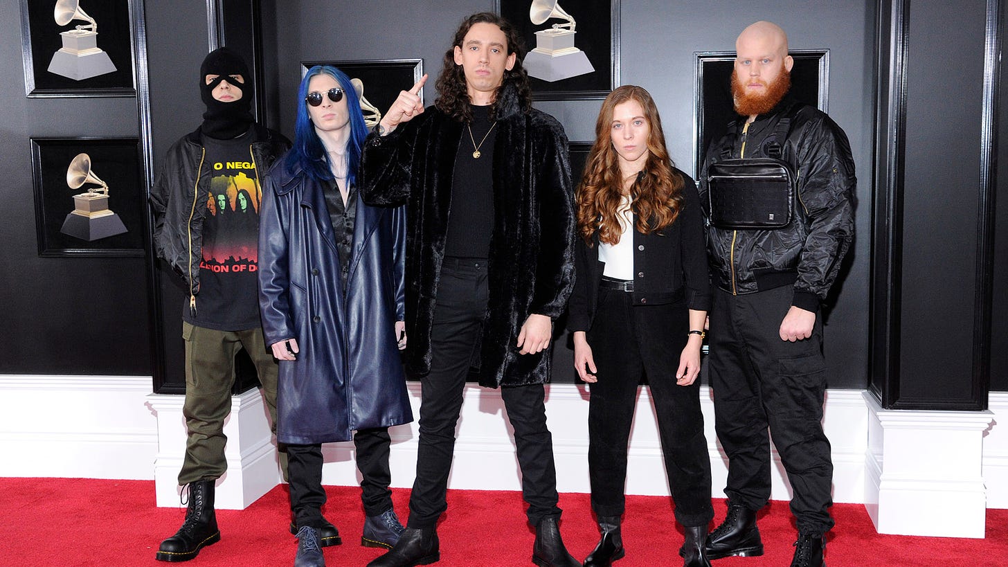 Code Orange, nominated for Best Metal Performance, make a colorful appearance on the red carpet.