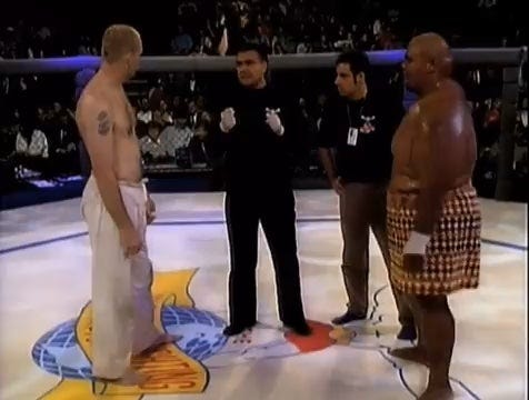 The very first UFC fight. Gerard Gordeau (Savate) vs Teila Tuli (Sumo) UFC  1 : r/ufc