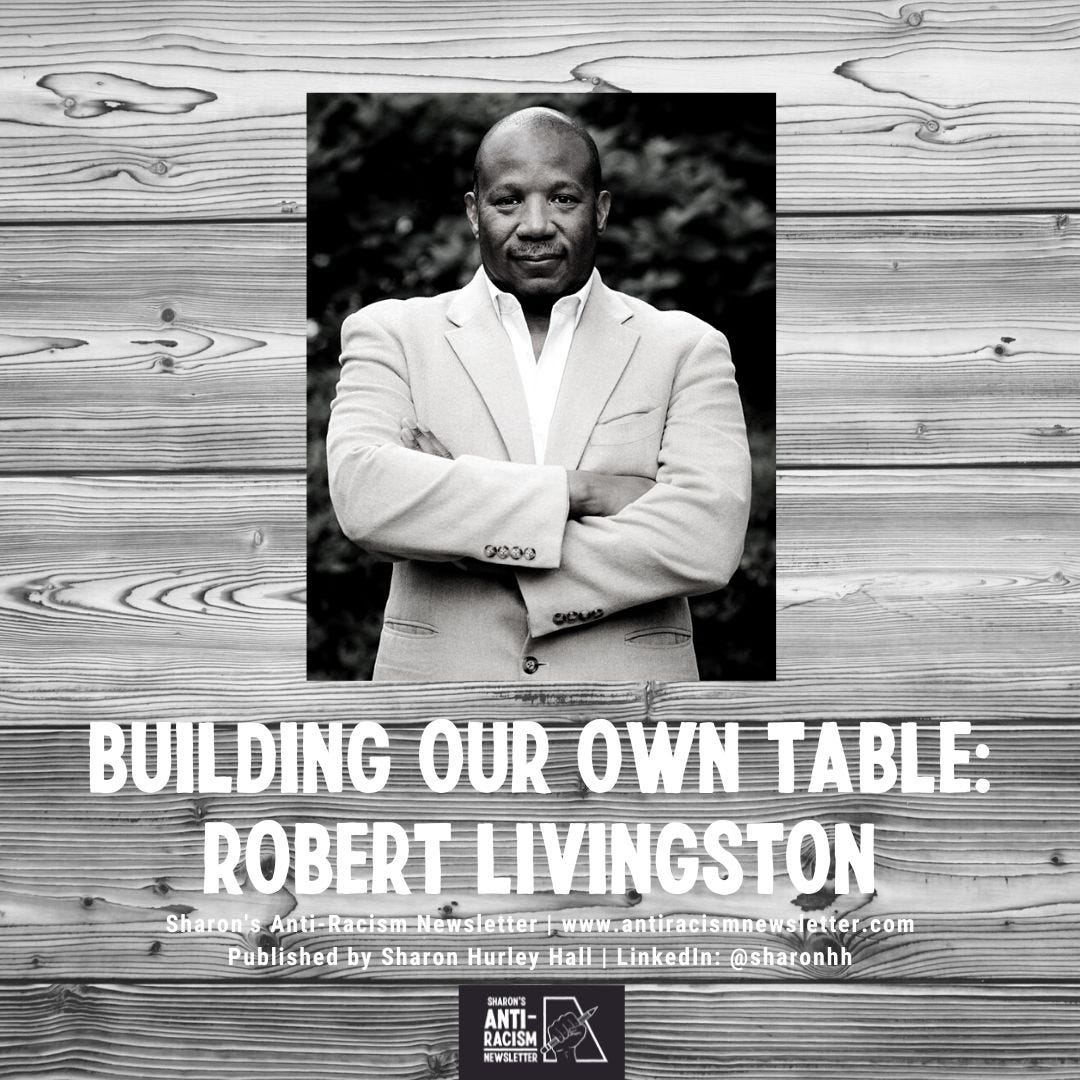 Building Our Own Table: Robert Livingston. Photo of Robert Livingston against a wooden table background
