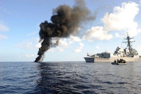 USS Haditha Watching The Suspected Pirate Skiff Burn