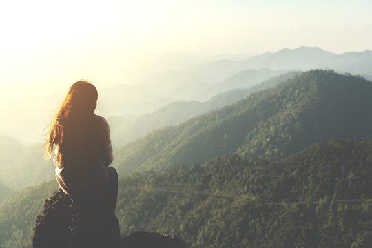 silhouette woman sitting on mountain in morning and vintage filter Stock  Photo | Adobe Stock
