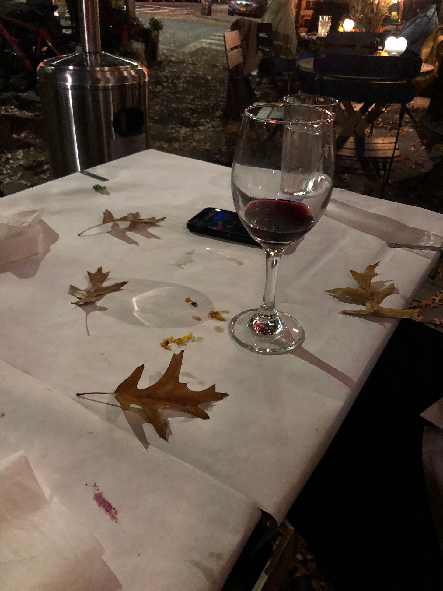 fallen leaves on dinner table