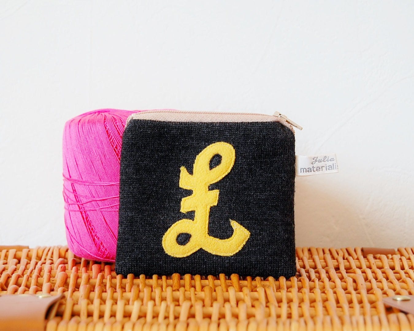 Coin purse with pound sign applique by Julia Laing