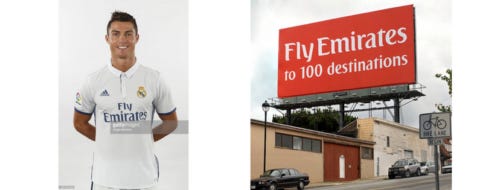 Christiano Ronaldo on the left, a Fly Emirates billboard on the right
