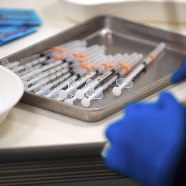 Moderna's Covid vaccine on a tray.