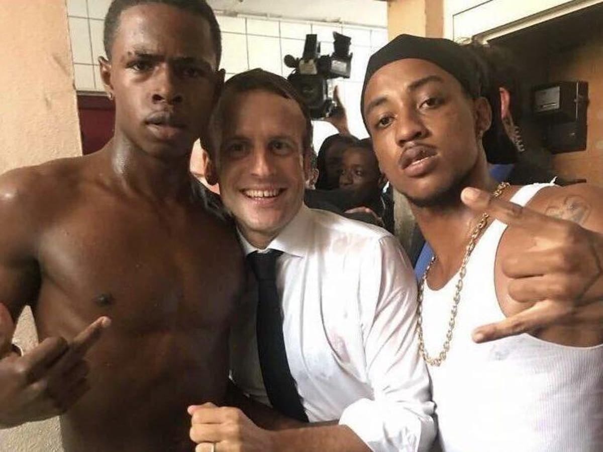 Macron photographed with man making obscene gesture | The Independent | The  Independent
