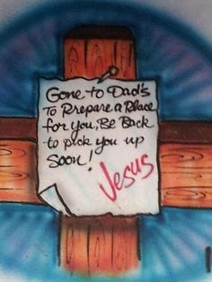 Wooden cross with note from Jesus, "Coming back soon"