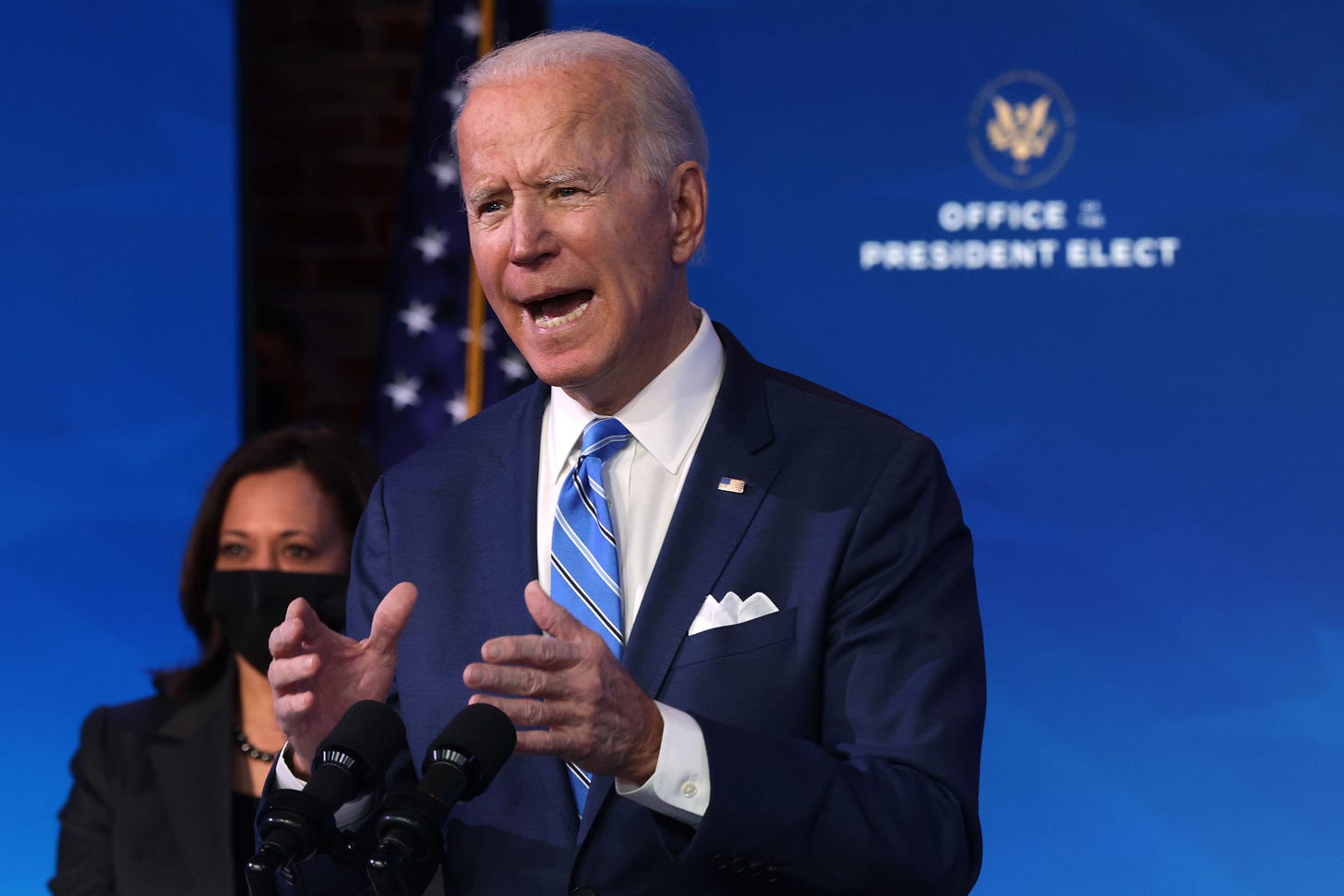 WILMINGTON, DELAWARE - JANUARY 14: U.S. President-elect Joe Biden (R) speaks as U.S. Vice President-elect Kamala Harris (L) looks on he lays out his plan for combating the coronavirus and jump-starting the nation’s economy at the Queen theater January 14, 2021 in Wilmington, Delaware. President-elect Biden is expected to unveil a stimulus package with a price tag of trillions of dollars including a $1,400 direct payment to individuals who have been struggling with the economic turmoil caused by the COVID-19 pandemic. (Photo by Alex Wong/Getty Images) WILMINGTON, DELAWARE - JANUARY 14: U.S. President-elect Joe Biden (R) speaks as U.S. Vice President-elect Kamala Harris (L) looks on he lays out his plan for combating the coronavirus and jump-starting the nation’s economy at the Queen theater January 14, 2021 in Wilmington, Delaware. President-elect Biden is expected to unveil a stimulus package with a price tag of trillions of dollars including a $1,400 direct payment to individuals who have been struggling with the economic turmoil caused by the COVID-19 pandemic. (Photo by Alex Wong/Getty Images)