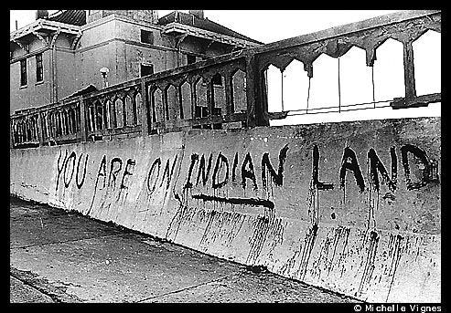 photo of Alcatraz - "you are on indian land" painted on railing