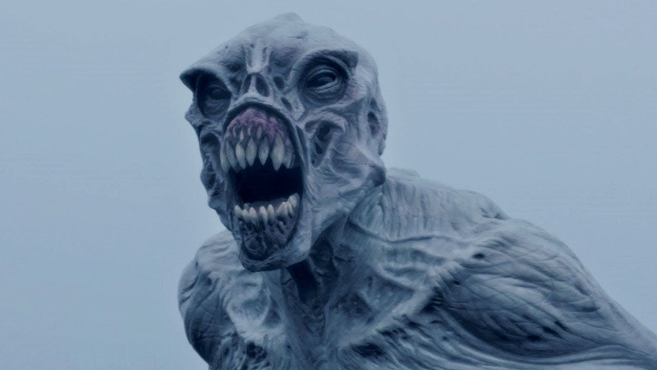 This image shows the snarling, razor-toothed visage and upper body of a Dreg, one of the surviving, mutated human beings living on far-future Earth in Doctor Who's "Orphan 55." This image shows the snarling, razor-toothed visage and upper body of a Dreg, one of the surviving, mutated human beings living on far-future Earth in Doctor Who's "Orphan 55."