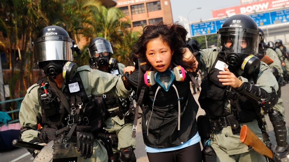 hong kong protests arrest girl bitcoin