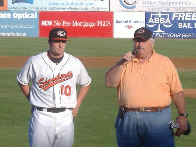 Sean accepts his Shorebirds Fan Club Player of the Half award from Fan Club President Gil Dunn.