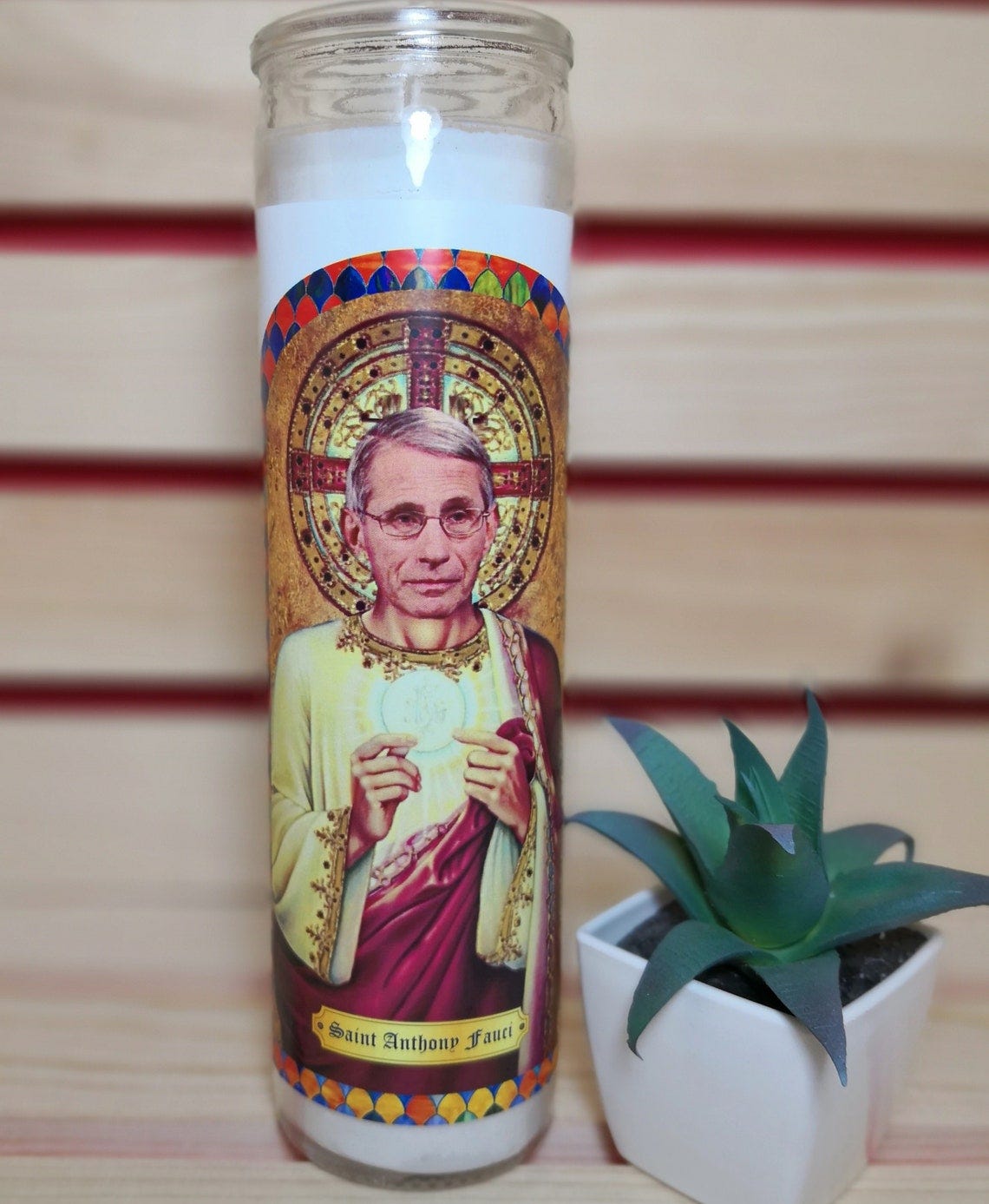 Image result from https://www.etsy.com/listing/904814529/dr-anthony-fauci-prayer-candle-saint?ga_order=most_relevant&frs=1