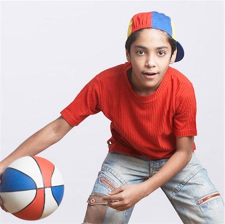Indian kids playing basketball Stock Photos - Page 1 : Masterfile