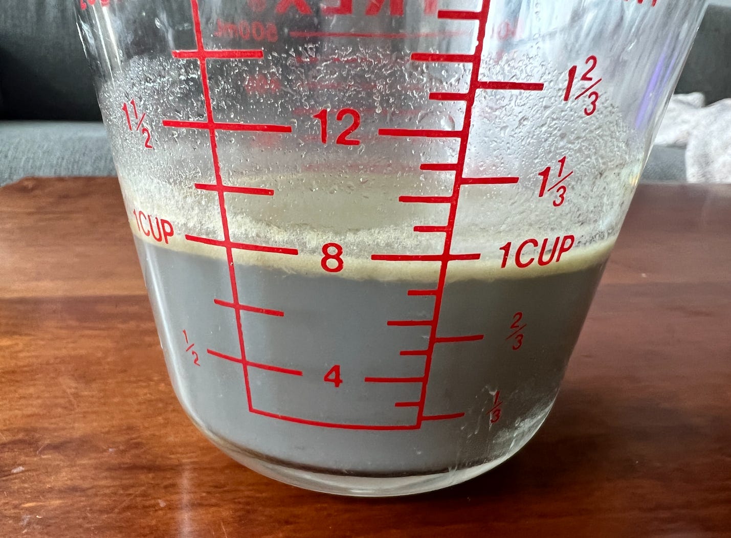 A close-up of a measuring cup

Description automatically generated with low confidence