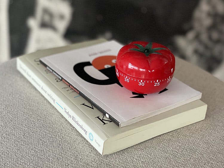Several short sentences about writing and Good Choices books. and a pomodoro kitchen timer