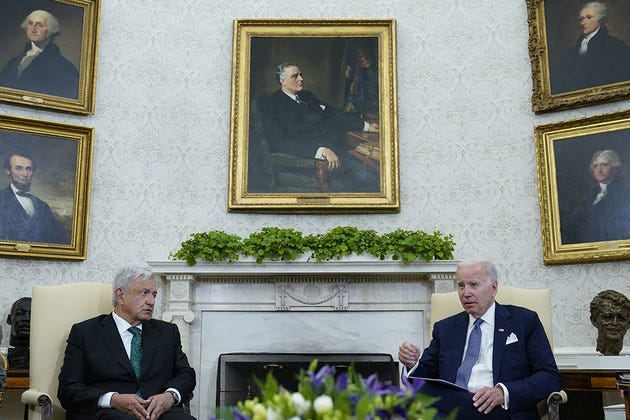 President Joe Biden, right, meets with Mexico's President Andrés Manuel López Obrador, left, in the Oval Office on July 12, 2022. | Susan Walsh/AP Photo