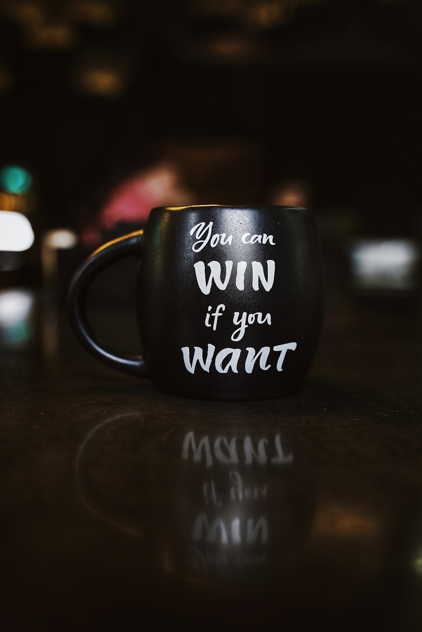 A mug saying You can win if you want