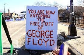 May be an image of road and text that says 'YOU ARE NOW ENTERING THE FREE STATE GEORGE FLOYD F'