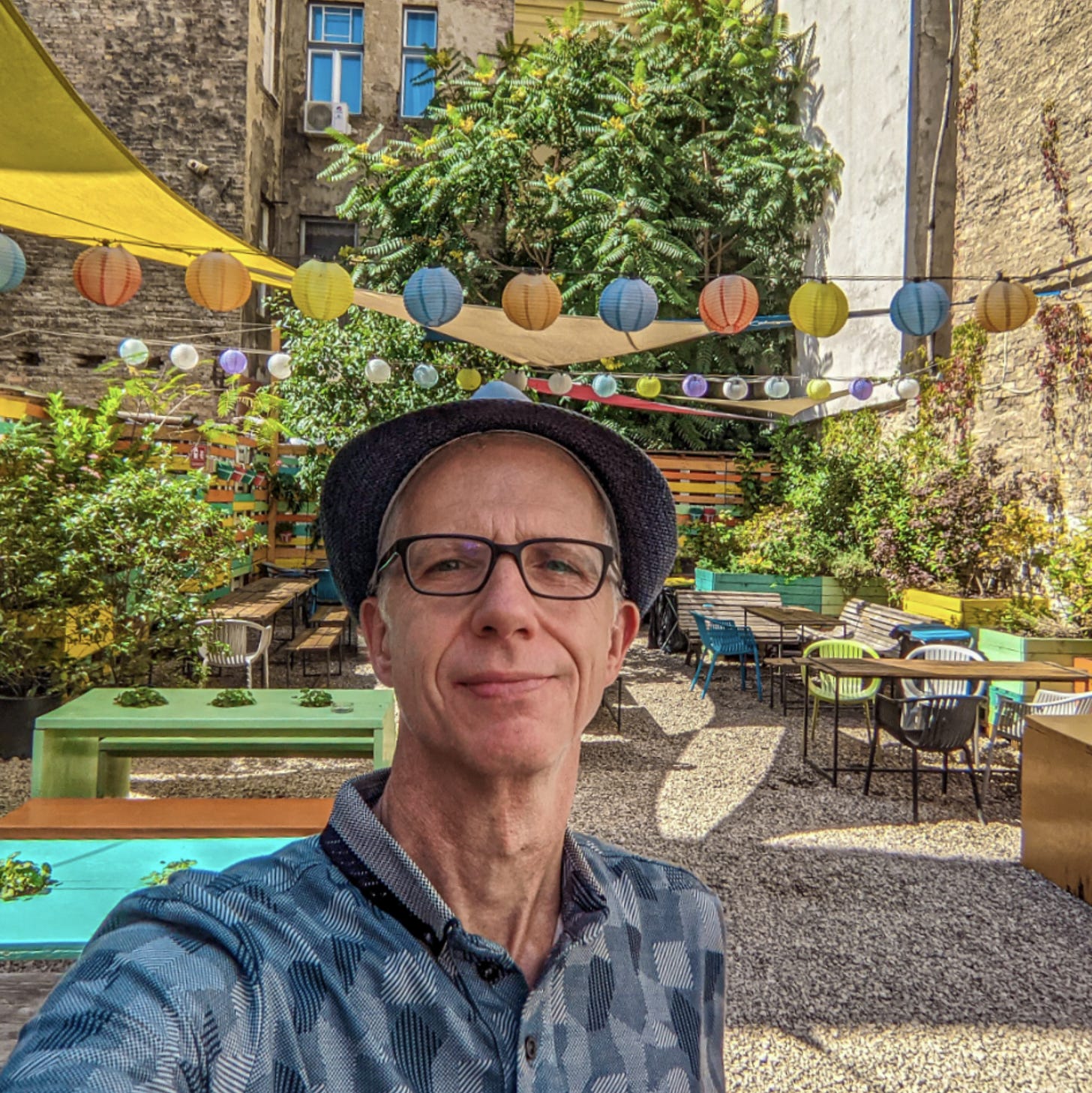 Michael in the courtyard of a restaurant in Budapest.