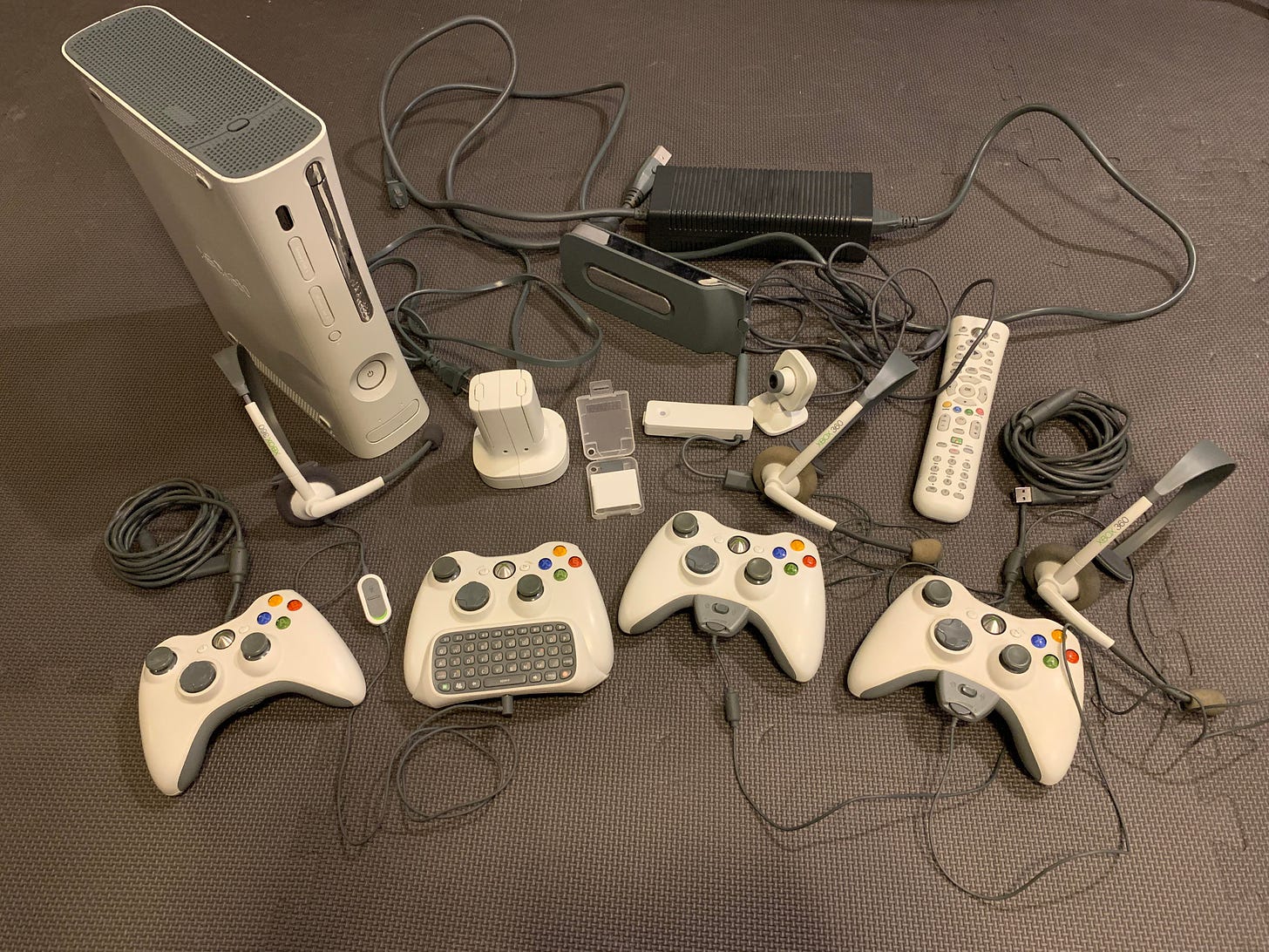 My launch model Xbox 360 still works over 15 years later :) we had bought  almost all the original accessories, so here's a slideshow of everything I  still have for it! Hope