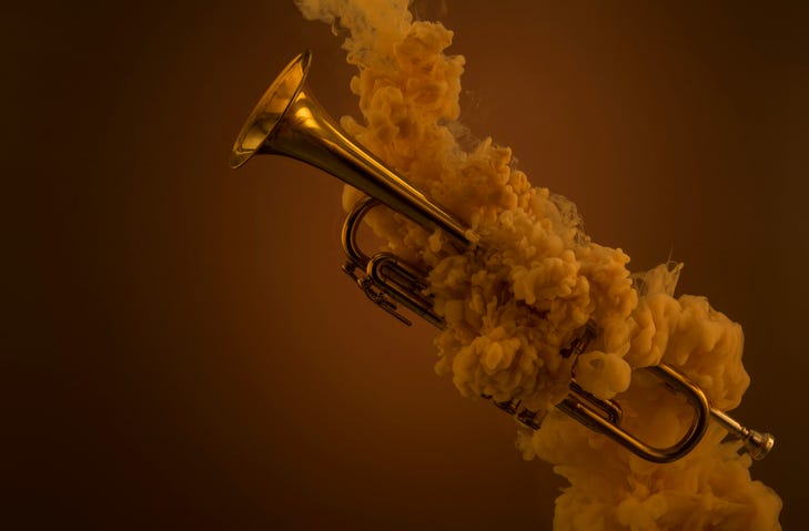 A trumpet surrounded by sepia smoke