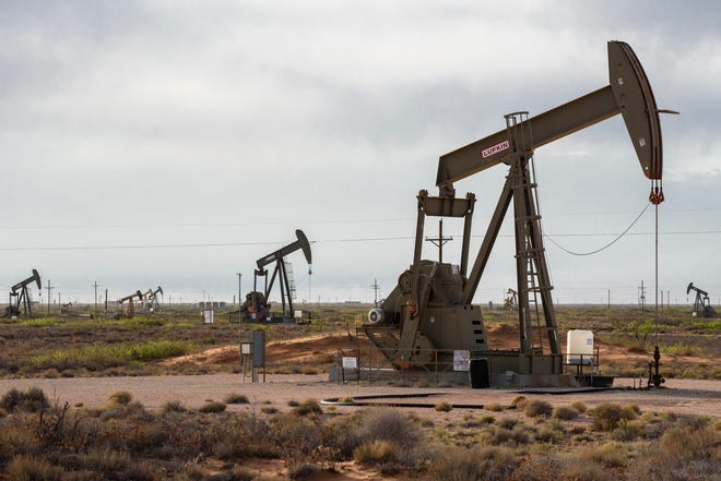 Oil and gas rigs dot the Permian Basin around Loco Hills, northeast of Carlsbad.