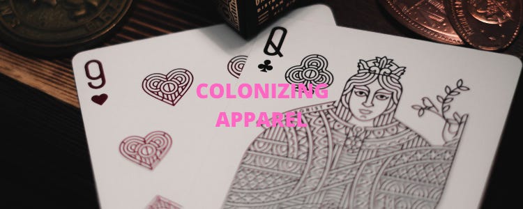 Two cards from a deck, one of which is a Queen of Clubs. The words "colonizing apparel" is superimposed over top the image. 