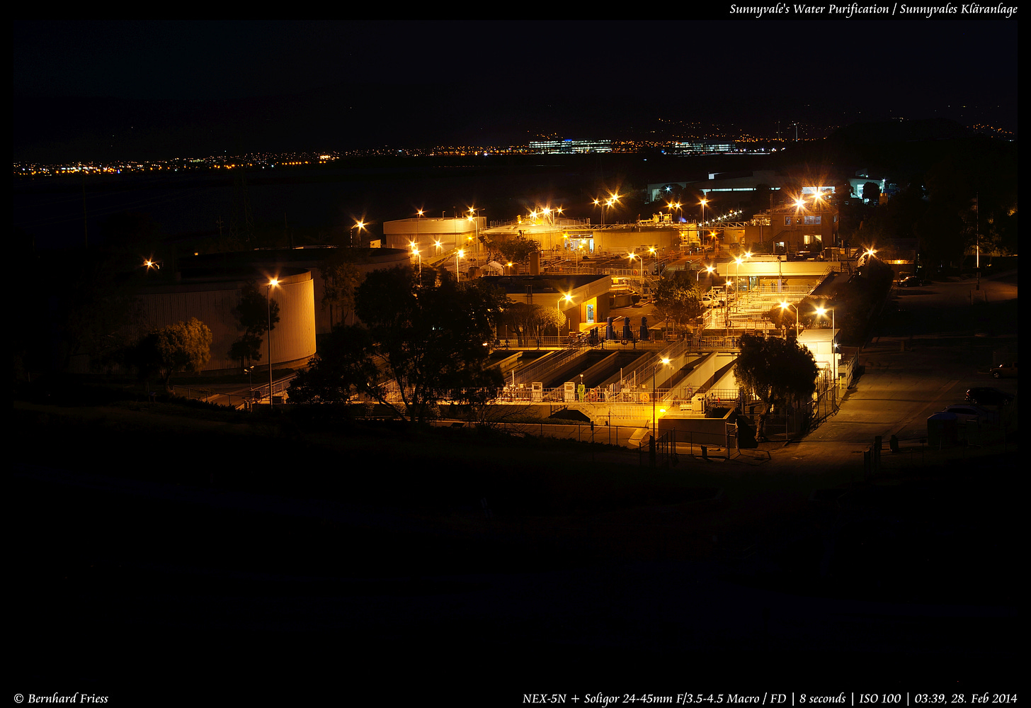A water purification plant, at night.