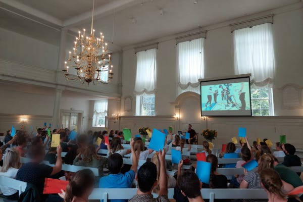 My lecture in the church in Zeist (the client asked me to blur the faces of the attendees).