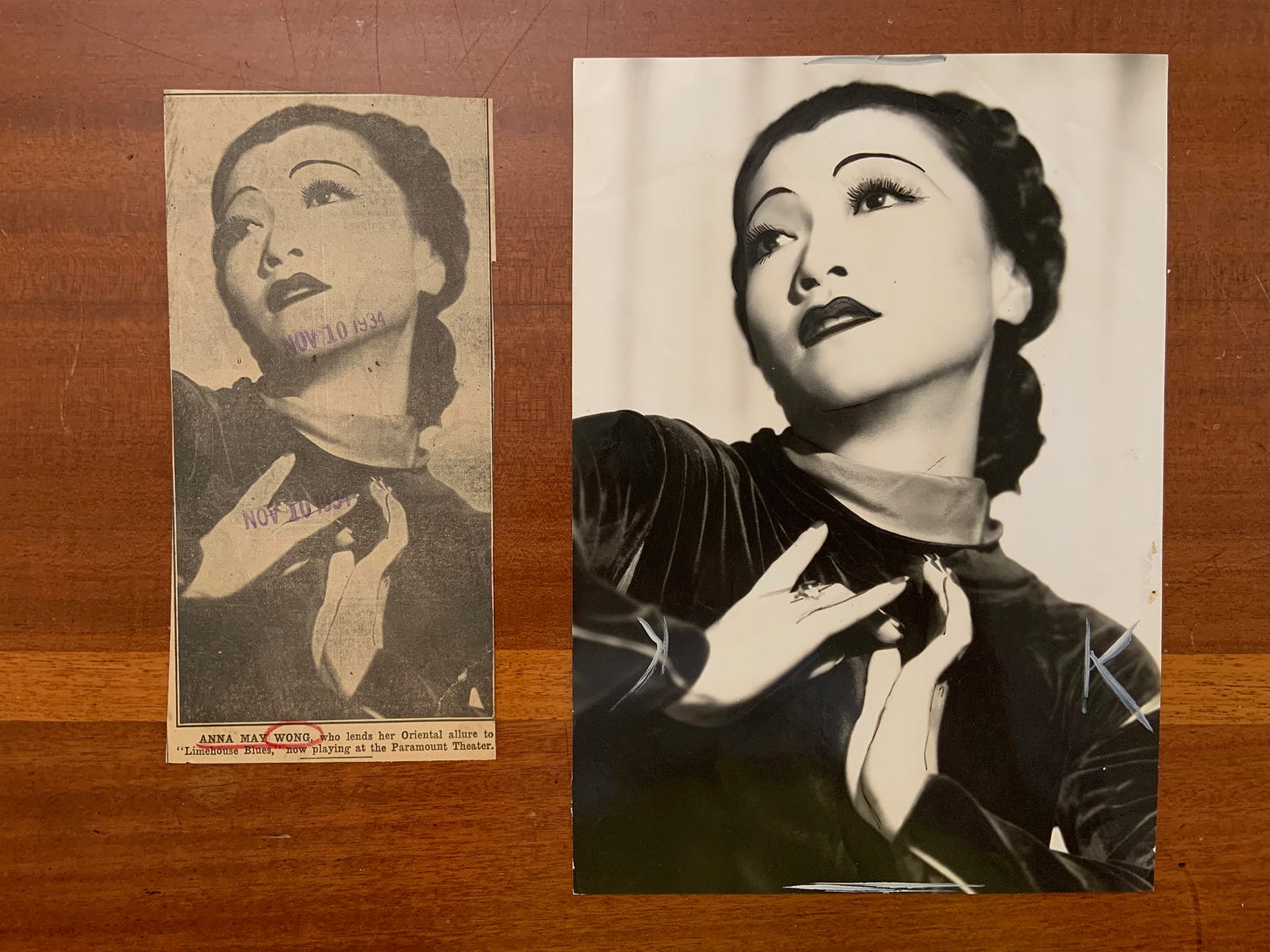 Two clippings of a black and white photo of Anna May Wong from the Los Angeles Examiner, November 10, 1934