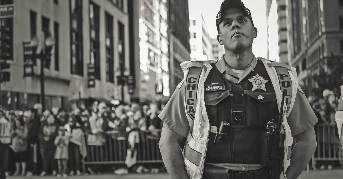 Grayscale Photo of a Police · Free Stock Photo