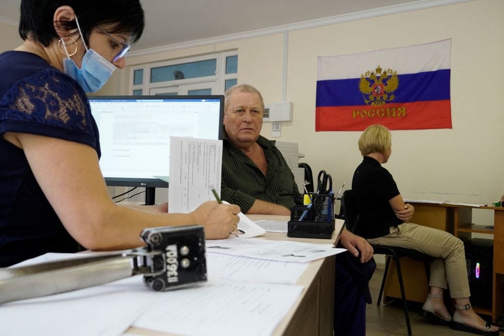 A man in Melitopol, Ukraine, applies for Russian passport, August 3. © Getty Images