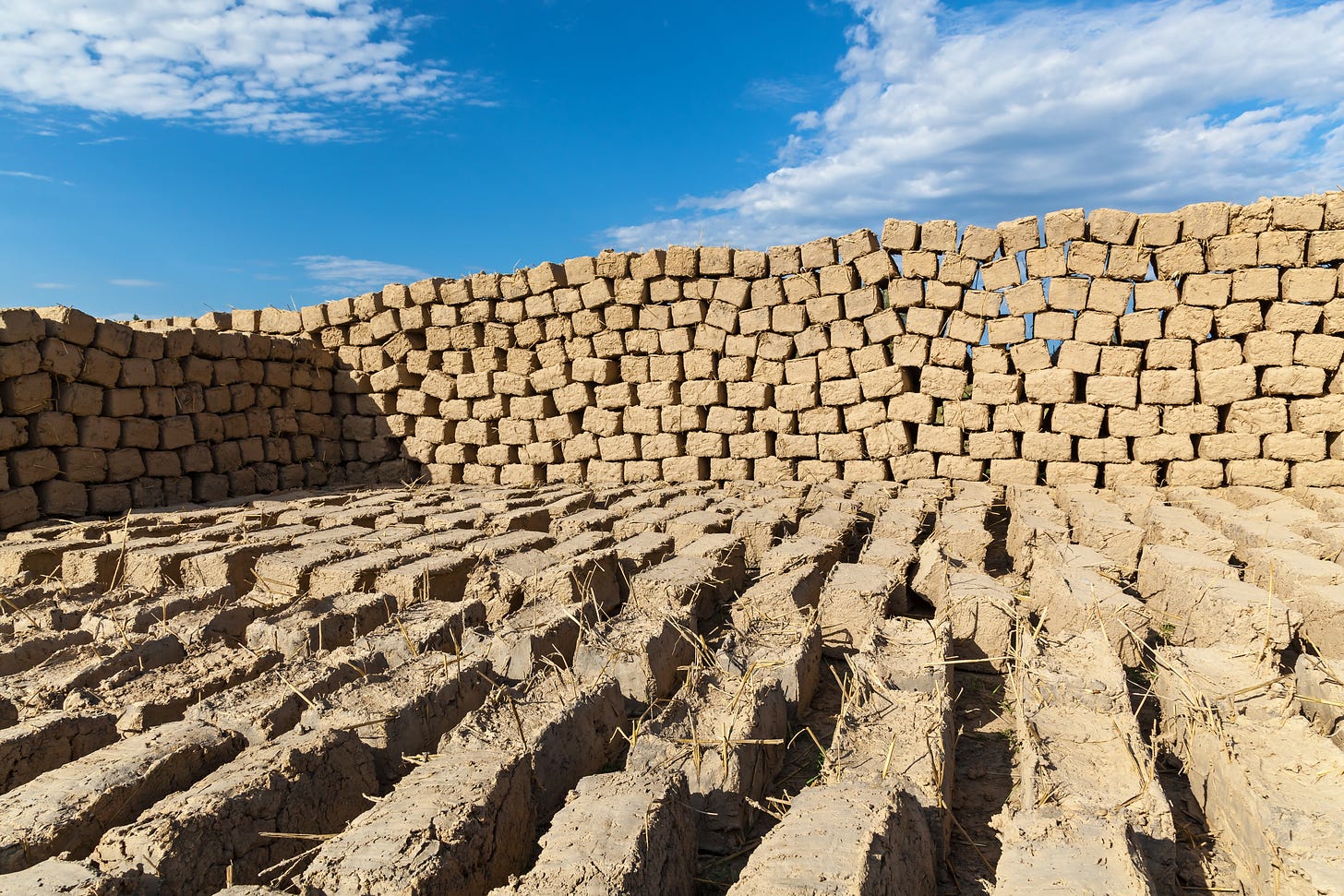 Bricks of mud and straw piled up