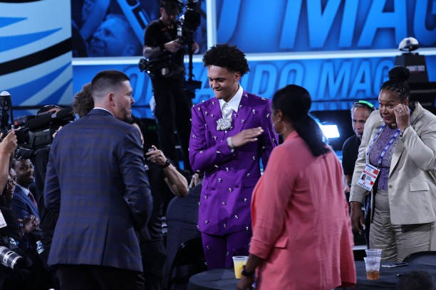 Paolo Banchero reacts after being selected number one overall by the Orlando Magic during the 2022 NBA Draft on June 23, 2022 at Barclays Center in...