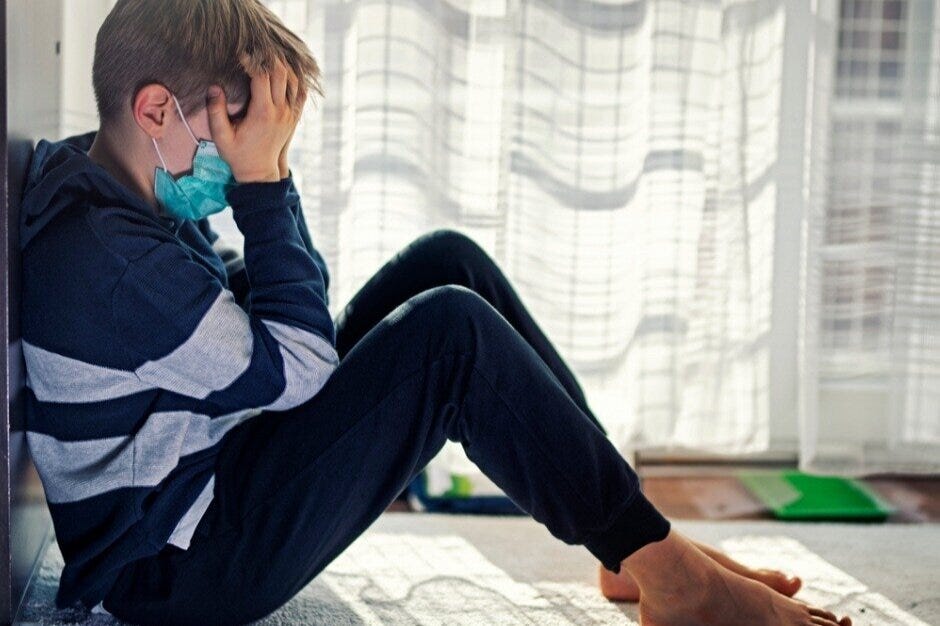 depressed-kid-during-epidemic-quarantine-picture-id1214716233.jpg