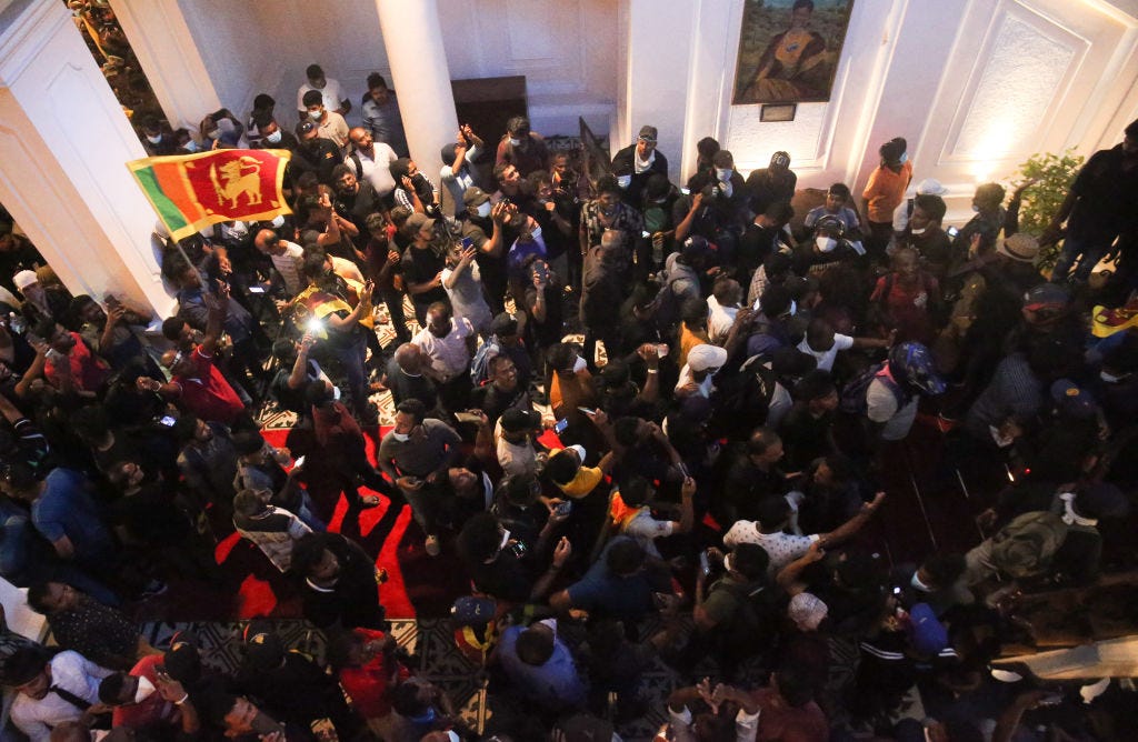 Protesters barging into the presidential residence in the Sri Lankan capital, Colombo, on July 9 2022