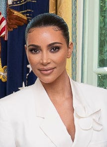 Kim Kardashian in a white suit