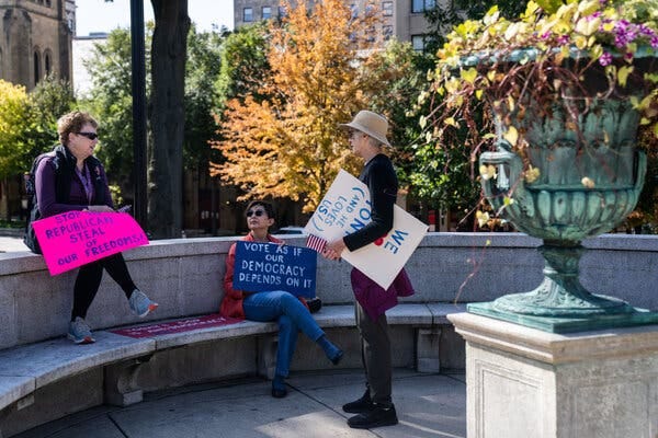 Abortion rights demonstrators prepared for an event last month in Madison, Wis., hosted by Gov. Tony Evers, a Democrat who is in a tight race for re-election.