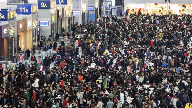 Travelers wait in the main hall of the Shanghai Hongqiao Railway Station in Shanghai, China, on January 30, 2019. 
