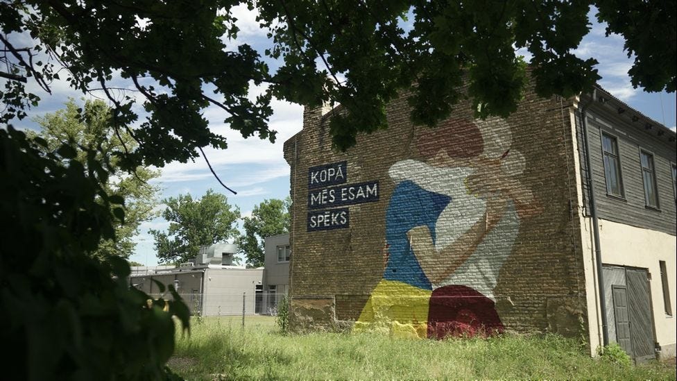 "Together we are strong": A mural in Riga shows two women in Ukrainian and Latvian colours